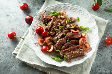 Beef steak with cherry salsa