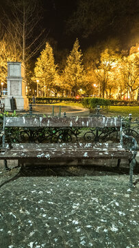 Park Bench covered in abnormal amount of Pigeon Feces