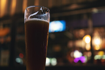 A glass of beer with a night of drinking