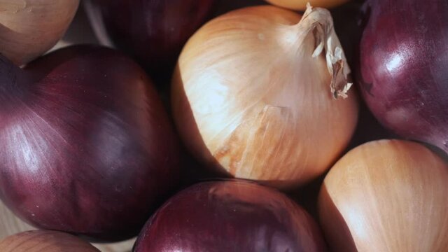 Full Frame Shot Of Purple end wite Onions. Rotation