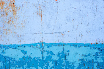 Abstract weathered blue metal cracked surface background