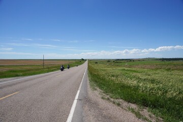 Fototapeta na wymiar Wanblee USA - 25 June 2013 - Motorists near Wanblee on Highway 44 in South Dakota