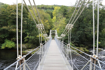 Fototapeta na wymiar The historic Llantysilio Chain Bridge over the River Dee.