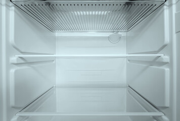Refrigerator open empty fridge inside interior. close up on empty refrigerator with door open. New...