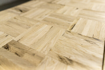 The close up of small sticks collected in a parquet