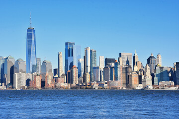 Buildings architecture of Manhattan, New York City seen from Ellis Island, New Jersey, USA.