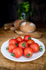 Dish with freshly washed cherries tomatoes. Fresh tomatoes Mediterranean diet