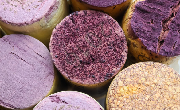 Makro closeup of pile isolated wine corks with red tartrate (focus on center)