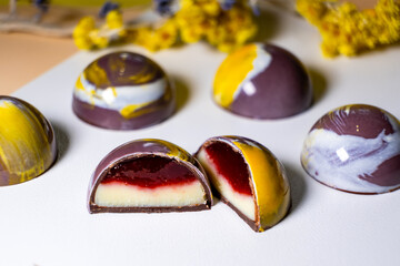 multicolored beautifully decorated handmade candies with fillings