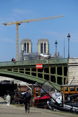 The yellow crane located in Paris center in order to rebuild the roof of Notre Dame. Paris, the 23 march 2021.