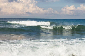Seascape.  Blue Sea, White Waves, Blue Sky.