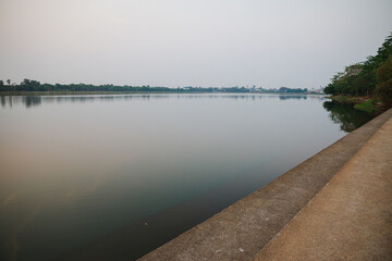 Obraz premium Sunset, sunrise with clouds, light rays on field at countryside Thailand