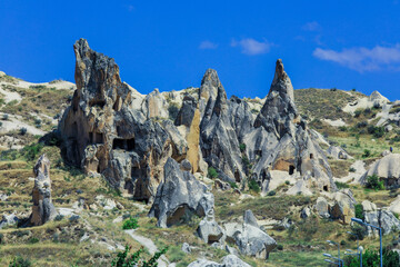 Fantastic View to the Göreme with rock houses in front of the spectacularly coloured valleys nearby, Cappadocia, Turkey
