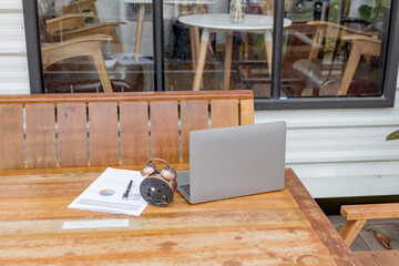 Workplace with notebook laptop Comfortable work table.