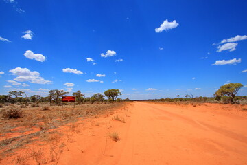 Road sign to Australian Aboriginal community in outback