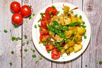 Food in a plate on gray wooden background