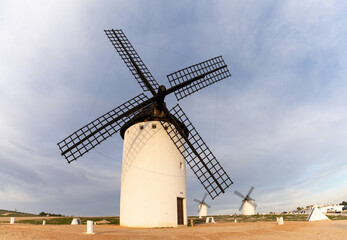 Fototapeta na wymiar the historic white windmills of La Mancha above the town of Campo de Criptana