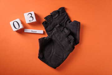 June 3 on wooden calendar, world bicycle day, on orange background