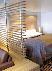 View into elegant clean modern design futuristic minimalistic ocean view suite with balcony,...