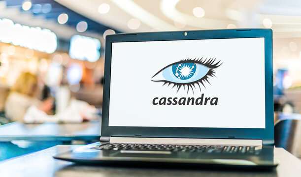 Laptop computer displaying logo of Apache Cassandra