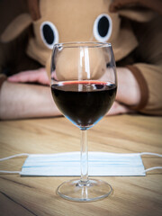 Office worker in cosplay costume of a cow. Guy in the funny animal pyjamas near the a glass of...