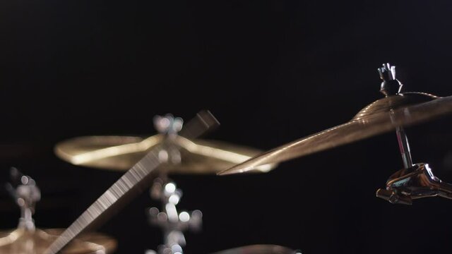 Close up of a drummer playing a crescendo on crash cymbal