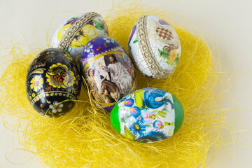 Colorful Easter eggs on a yellow background