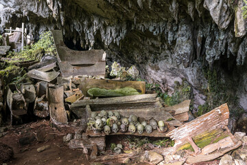 The spectacular cave tomb of Lombok Parinding which has housed the dead of Tana Toraja since 700...
