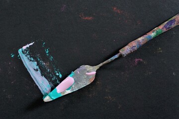palette knife on a black background