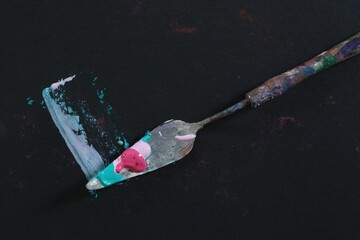 palette knife on a dark background