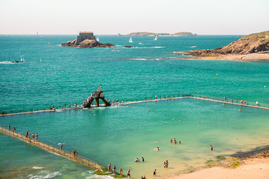 Beach , people and sea open swimming pool in Saint Malo, France