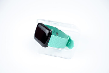 new smart fitness bracelet with blank black screen in a transparent plastic box