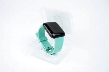 new smart fitness bracelet with blank black screen in a transparent plastic box