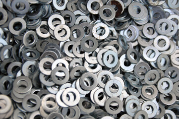 A set of mounting washers. Flat metal washer. Background.