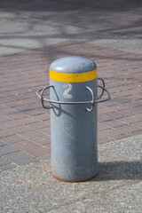 Car entering prevention pole on the pathway.   North Vancouver BC Canada
