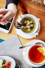 business lunch food in a cafe on a wooden table photo from above