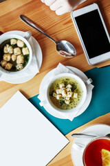 business lunch food in a cafe on a wooden table photo from above