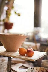 Pottery studio The process of creating pottery. The master ceramist works in her studio. workplace of potter