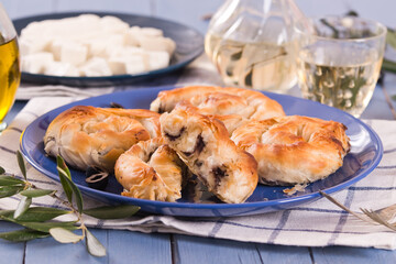 Pastry swirls with cheese and olive filling.
