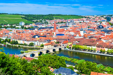 Fototapeta na wymiar Colourfull panoramic cityscape central part of Wurzburg city. Top view from the Marienberg Fortress (Festung Marienberg). Germany.