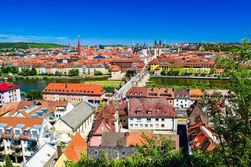 Fototapeta na wymiar Colourfull panoramic cityscape central part of Wurzburg city. Top view from the Marienberg Fortress (Festung Marienberg). Germany.