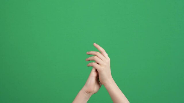 Applause. Kid clapping hands, applauding on green screen chrome key background. 4k video