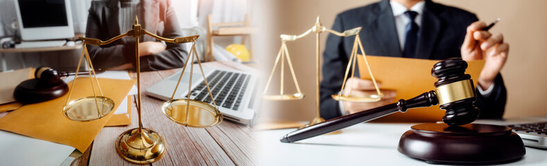 Business and lawyers discussing contract papers with brass scale on desk in office. Law, legal services, advice, justice and law concept