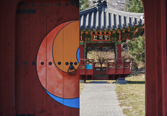 A gazebo with traditional Korean designs. Kiev Botanical Garden.