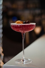 red cocktail on the table