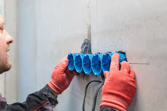 A set of plastic inserts for red and blue sockets. Construction vacuum cleaner - Powered by Adobe