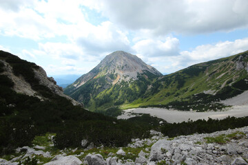 View of a mountain peak ascending to the southern peak of the Dachstein mountain in Austria.
