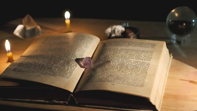mysterious book with spheres with stones, mystical atmosphere