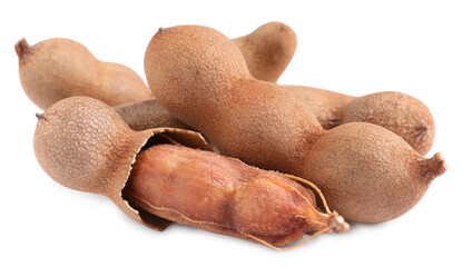 Delicious ripe tamarinds on white background. Exotic fruit