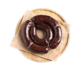 Tasty blood sausages and wooden board on white background, top view